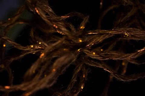 Warm Golden Thread on Soft Texture, Cozy Abstract Light Foto stock