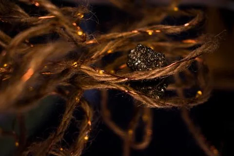 Warm Golden Thread on Soft Texture, Cozy Abstract Light Foto stock