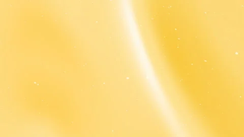 Warm Golden Yellow Gradient Background with Shifting Light and Particles Stock Footage 327501046