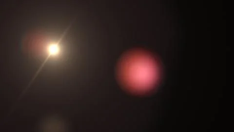 Warm Golden Yellow Optical Light Flare with Soft Rays and Red Circular Orb イラスト素材