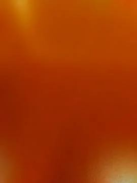 Warm Gradient Background with Soft Light and Orange Hues. Stock Photos