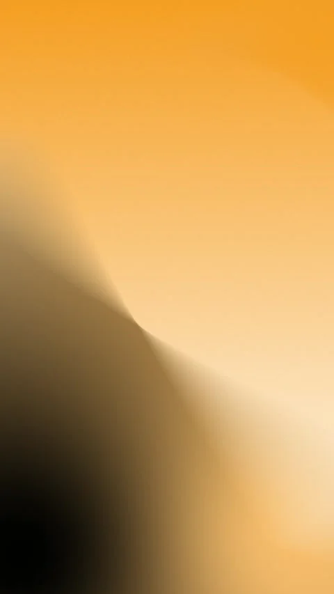 Warm gradient blur with soft orange and brown hues, creating a smooth Stock Footage 309956948