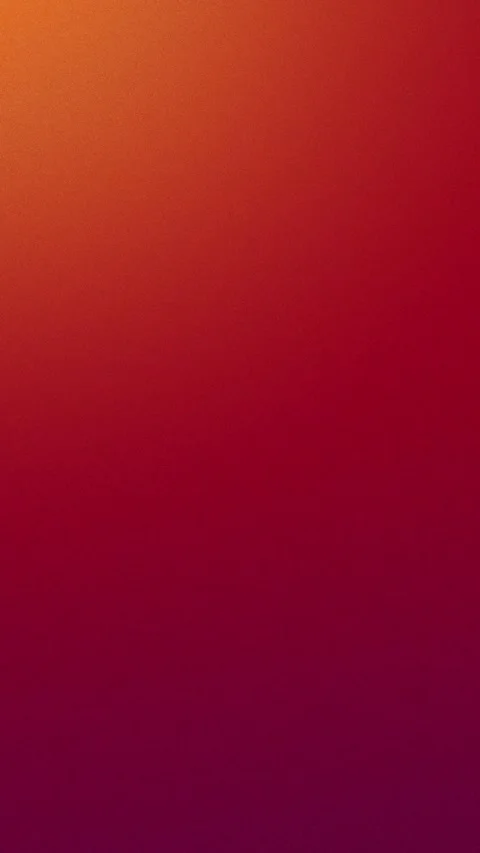 Warm gradient texture with orange to crimson hues, seamless loop background. 4K. Stock Footage 309855975