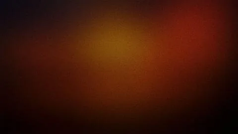 A warm, grainy gradient background transitioning from deep red to amber ton.. Stock Photos