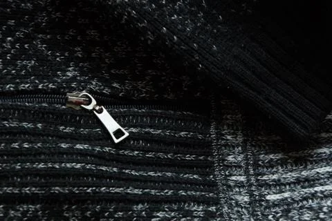Warm gray light dark gradient woolen sweater pocket lock zipper wool close-up Foto stock