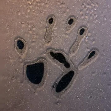 Warm hands on a cold car some frosty winter morning. - No unsharpen mask. Stock Photos