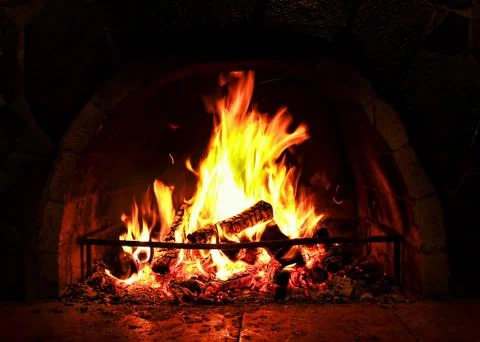 Warm Hearth in dark. Stock Photos