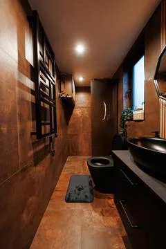 Warm industrial bath nook with rust tiles and matte black fixtures Stock Photos