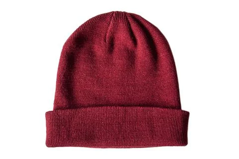 Warm knitted red wool hat on insulated white background, top view Stock Photos