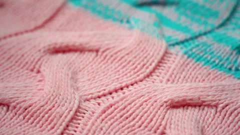 Warm knitted sweater with a pattern Vídeos de archivo 98835922