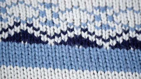 Warm knitted sweater with a pattern Stock Footage 98851291