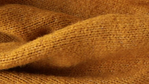 Warm knitted textile close-up. Wool material background macro Vídeos de archivo 164228656