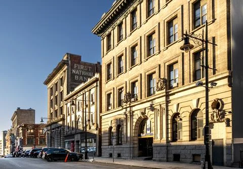 Warm late-day light illuminates historic brick buildings along Ellison Street Stock Photos