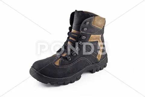 Warm leather boot for wearing in winter or traveling isolated Stock Photos