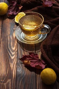 Warm lemon tea preparing for an autumn day Stock Photos