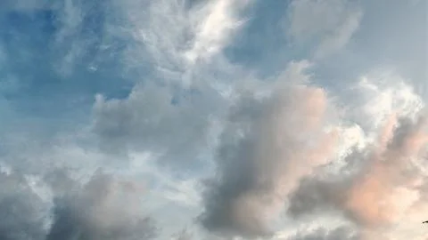 Warm Light Clouds in Pastel Sky Fotos de archivo