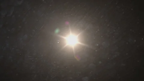 The warm light on the dark background. anamorphic lens flare. Stock Footage 104905852