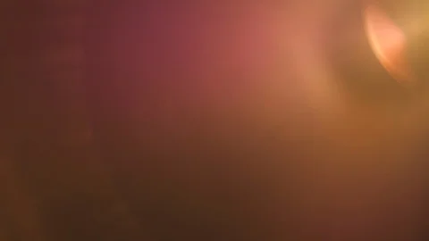 Warm light flares in motion special effect on a black background Stock Footage 106342690