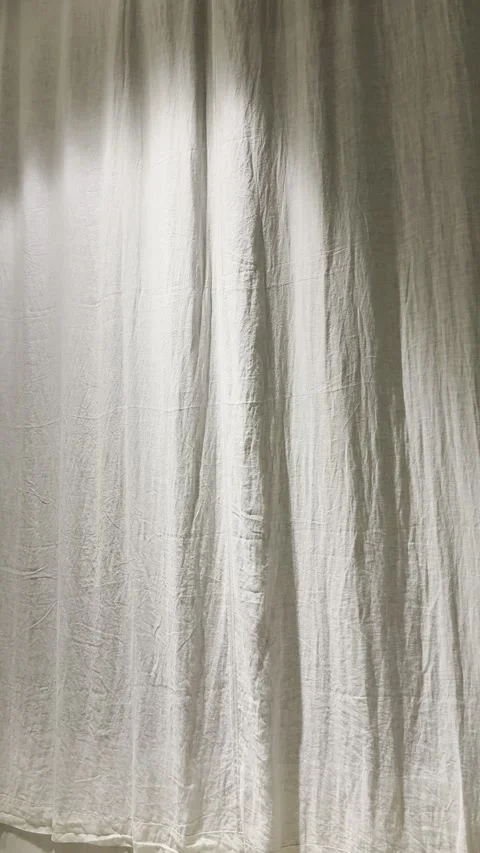 Warm Light on Textured Off White Linen Curtain Background Vertical Stock Footage 339461618
