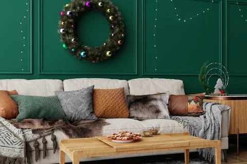 A warm living room features a sofa with colorful pillows and a green wall. .. イラスト素材