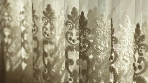 Warm morning sunlight shining through elegant lace tulle curtains Video stock 338191708