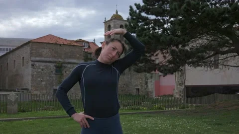 Warm-up of the neck before training outside. Stock Footage 172106706