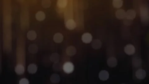 Warm Night Bokeh Background with Soft Vertical Light Streaks Stock Footage 341840470