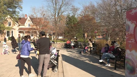 Warm November day Small town Canada main street with people tourists and patios Stock Footage 164714892