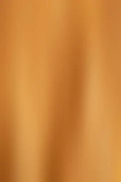Warm orange abstract background with soft vertical gradient and subtle folds for Stock Photos