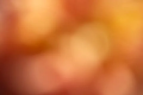 Warm Orange Abstract Background with Soft Golden Glow Stock Photos