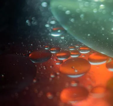 Warm Orange Abstract Liquid Bubbles With Depth and Soft Glow Stock Photos