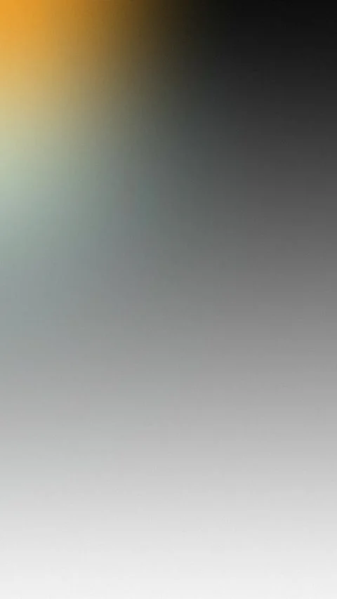 Warm orange to cool grey gradient with grainy texture, creating a seamless loop Stock Footage 310143588