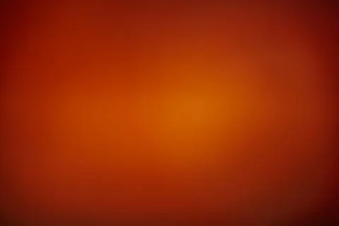 Warm orange gradient background with smooth transitions to deep Stock Photos