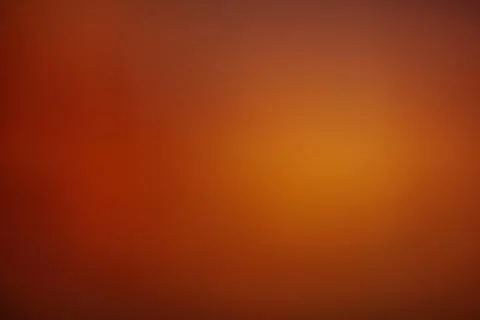 Warm orange gradient background with smooth transitions to deep Stock Photos
