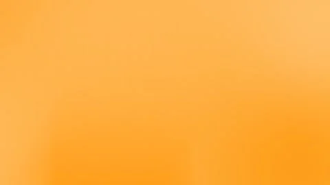 Warm orange gradient with subtle grid texture, forming a seamless loop Stock Footage 299397118