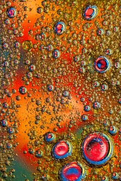 Warm orange oil bubble texture with detailed microscopic liquid patterns Illustrazione stock