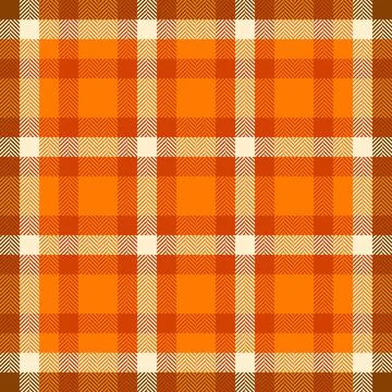 Warm plaid pattern. Seamless fabric texture with orange, brown, and cream hue Illustrazione stock
