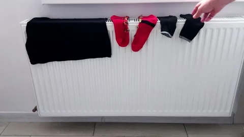 Warm Radiator with Clothes Drying- Everyday Home Life Moment 스톡 동영상 318868158