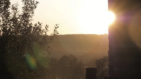 Warm Rays Of Sun At Sunset On A Hot Summer Day Shine Into The Camera Stock Footage 129898353