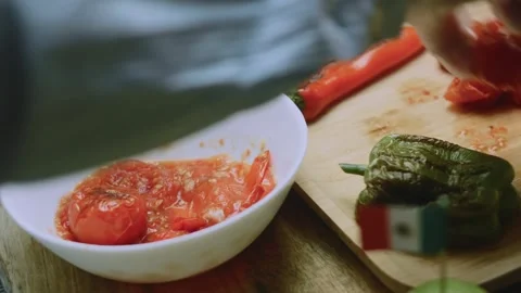 Warm recipe view of stirring chunky homemade tomato salsa Stock Footage 342152751