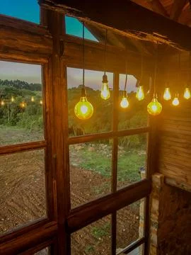 Warm Rustic Interior with Hanging Lights Stock Photos