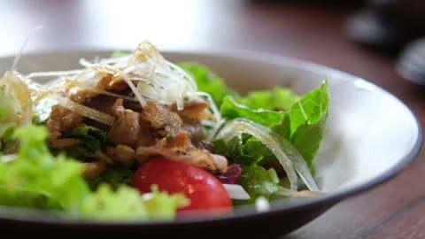 Warm salad with roasted or grilled salmon, potato, asparagus, broccoli and fresh Stock Footage 316069894