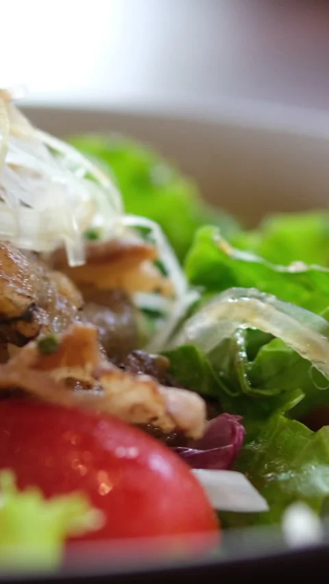 Warm salad with roasted or grilled salmon, potato, asparagus, broccoli and fresh Stock Footage 316384120