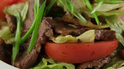 Warm salad with veal and roasted mushrooms, closeup 動画素材 56448044
