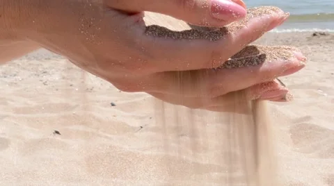 Warm Sand Running Through Hands Stock Footage 46128856
