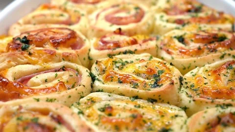 Warm Savory Breakfast Rolls with Melted Cheese and Ham Stock Footage 328050127