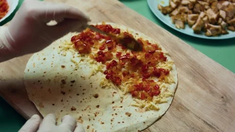 Warm stack of toasted tortilla wedges ready to serve in tight shot, 4K Stock Footage 341105252