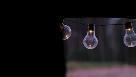 Warm String Lights Hanging Outside Rooftop Tent Creating Cozy Night Camping Mood Stock Footage 327318390