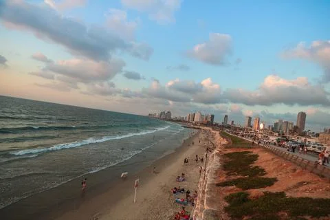 Warm Summer Sunset On A Sandy Beach In Tel Aviv, Israel Stock Photos