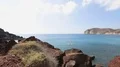 Warm summer wind gently pushing little uncertain waves of Aegean sea to shore HD Footage